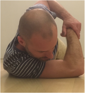 Dr. Gorczynski demonstrates posterior capsule stretch (sleeper stretch)